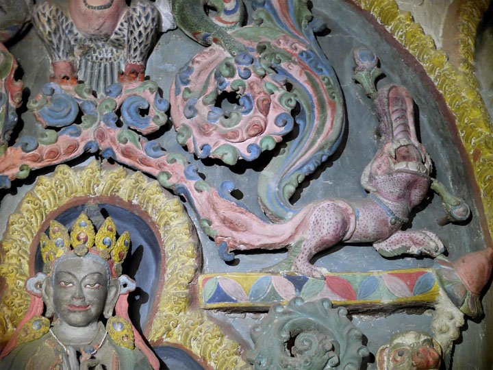 Detail of Vairocana Buddha and animals, rare 11th century Indo-Tibetan clay sculptures, main altar Lamayuru Monastery, Ladakh