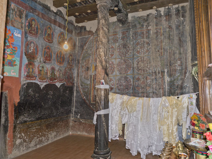 View of Vajradhatu mandala on back wall, adjacent to a variety of wall paintings that post-date the Indo-Tibetan period, another example of repainting that threatens the survival of the originals