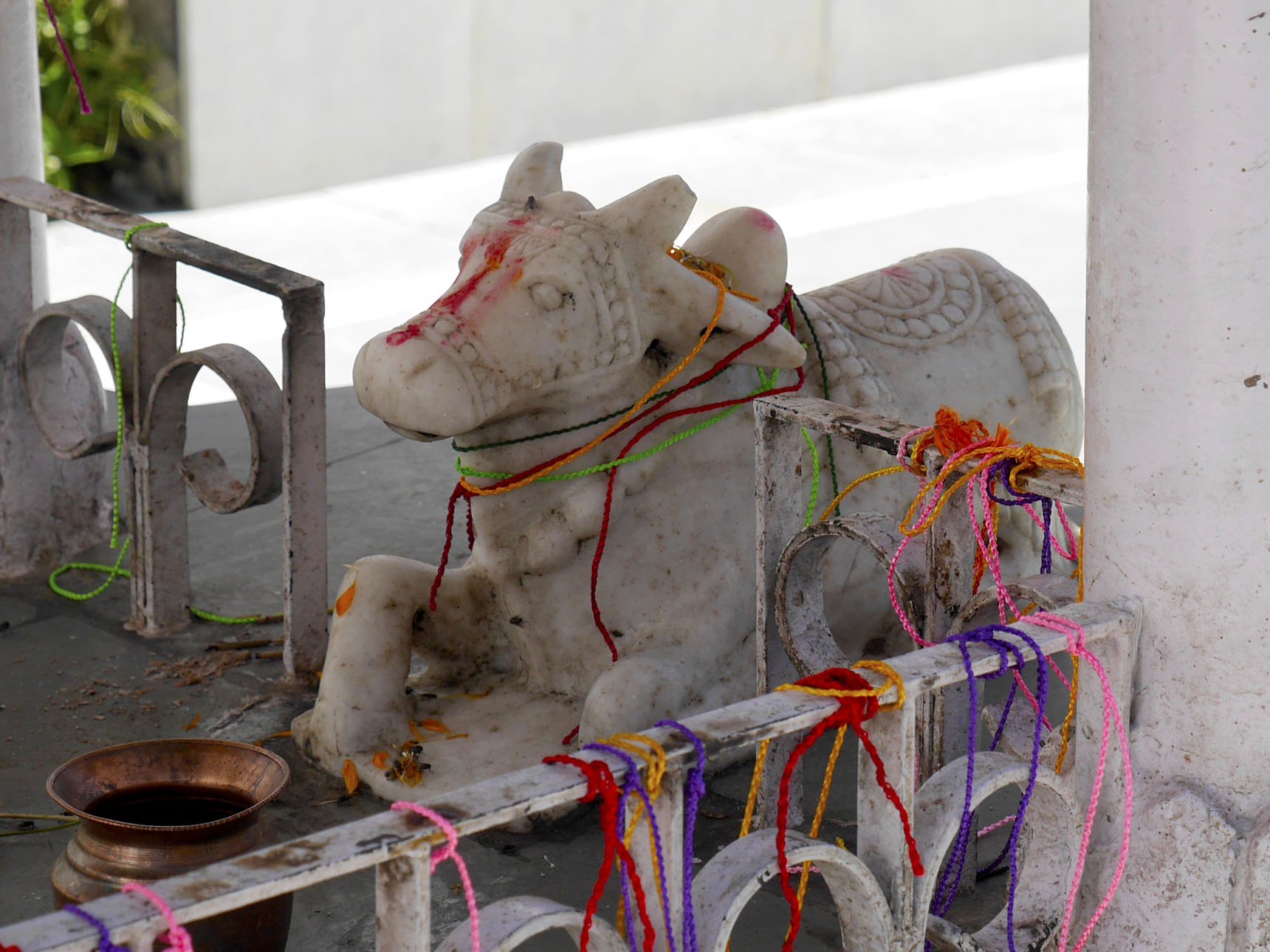 The cow is a sacred animal to Hindus, representing life and the sustenance of life. This sculpture is located in the center shrine of the courtyard at Phakpa Temple, Triloknath, Lahaul