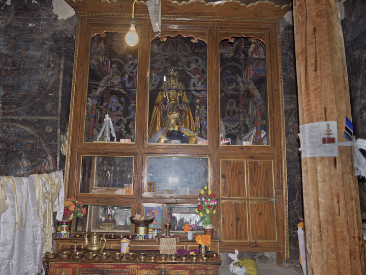 View of Nangbarnangzad interior, with Indo-Tibetan clay sculptures and wall paintings. The altar is now unfortunately encased by glass making it difficult to see the fine craftsmanship of Kashmiri artists, ca. early 11th century, Ladakh