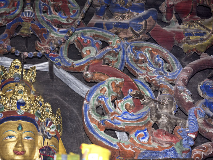 Detail of Vairocana Buddha, with ornate scrollwork, animals and figurines, rare 11th century Indo-Tibeta clay sculptures, altar of Nangbarnangzad, Mangyu Monastery, Ladakh