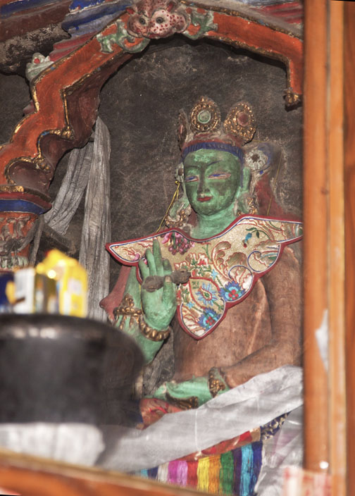 Detail of Amoghasiddha, a Dhyani (Supreme) Buddha, rare 11th century Indo-Tibetan clay sculpture, altar of Nangbarnangzad, Mangyu Monastery, Ladakh