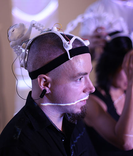 Aaron Trocola wearing his Dual Brains custom designed EEG headgear.